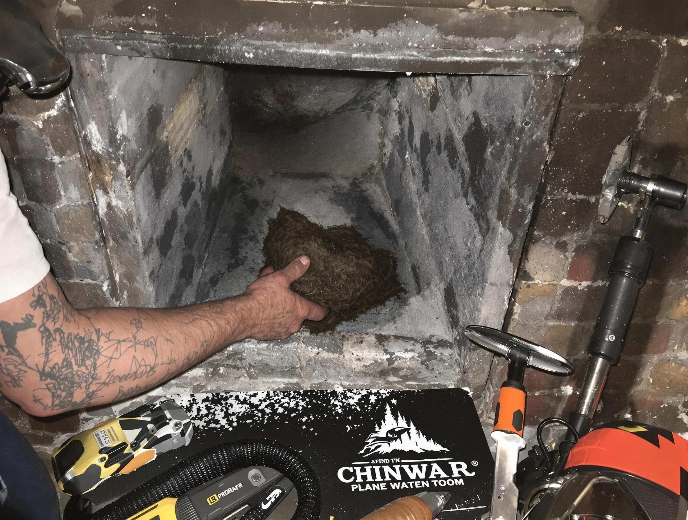 Brentwood Chimney Sweep safely removing debris and screening chimney in Brentwood, PA