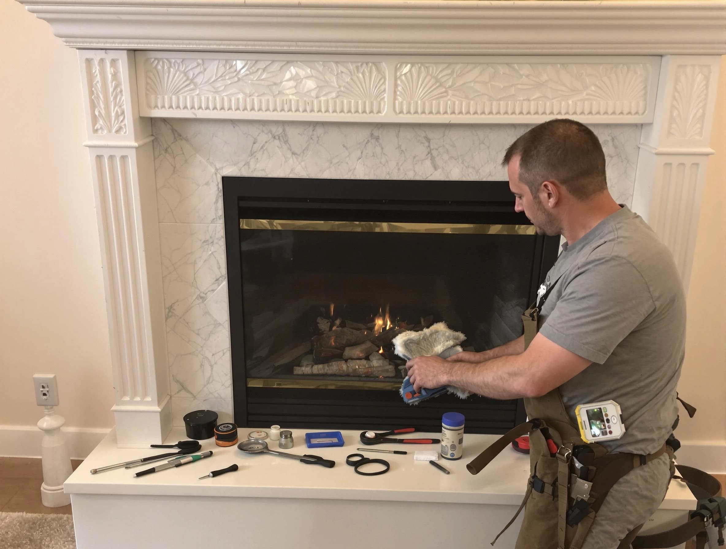 Brentwood Chimney Sweep performing fireplace maintenance in Brentwood, PA
